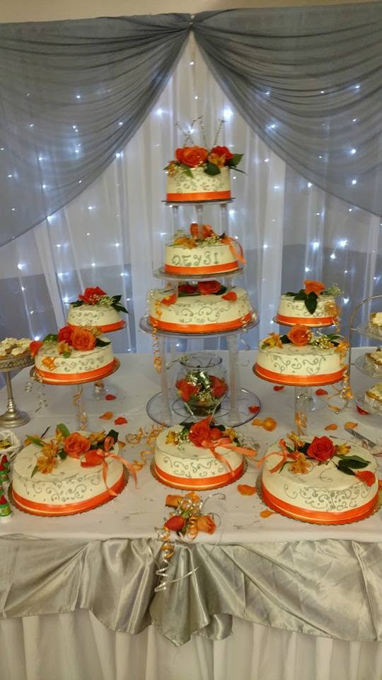 Pastel grande con betún naranja